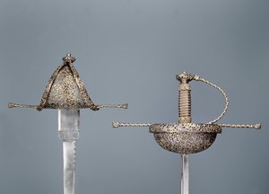 Svärd: gripar med skålfäste av mejslat stål; vänsterhänt dolk signerad `Antonio Cilenta de Neapoli fecit, båda 1600-talet av Unbekannt Unbekannt