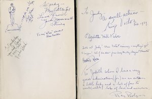 Fria framsidor av "Trollkarlen från Oz" av Frank L. Baum, inskrivna till Judy Garland av skådespelare och besättningsmedlemmar i filmen av Unbekannt