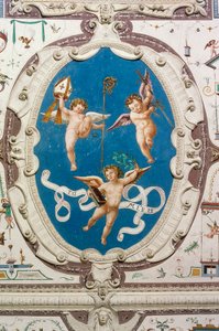 Oval föreställande tre putti (1560), detalj av Hall of Grotesques tak, Della Manta Castle, Manta (Cuneo), Piemonte, Italien av William M. Timlin