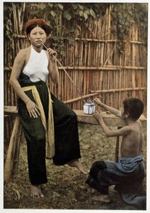 Asiatisk kvinna som röker opium, cirka 1898 av Unknown artist