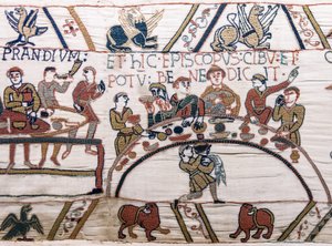 Biskop Odo välsignar maten och vinet, Bayeux Tapestry (ullbroderi på linne) av Unknown artist