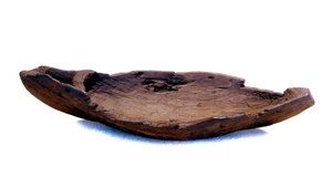 Vikingträleksak i form av ett skepp (drakkar) hittad nära en vikingaplats på Grönland.