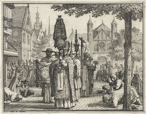 Procession med en staty genom en gata