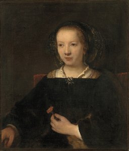 Ung kvinna med en nejlika av Willem Drost