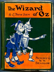 The Wonderful Wizard of Oz - The Wizard of Oz: omslag till en gammal upplaga (mellan 1905 och 1920) illustrerad av Denslow, William Wallace (1856-1915) av Frank Baums bok (1856-1919) - fågelskrämman och trämannen i tenn - privat samling - av William Wallace Denslow