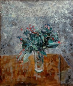 Blommor i ett högt glas
