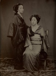[Geisha med skötare], 1860-talet. av Yokoyama Matsusaburo