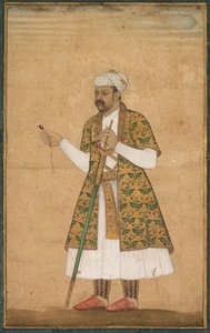 En hovman, möjligen Khan Alam, som håller en spinell och ett Deccan-svärd av attributed to Govardhan