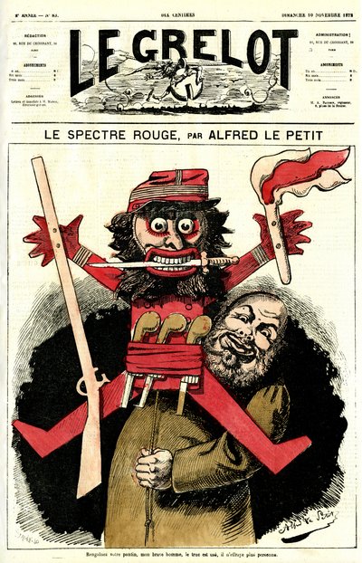 en katolsk präst viftade med en liten figur av Alfred Le Petit