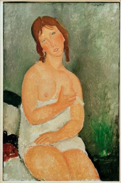 Ung kvinna sitter av Amedeo Modigliani