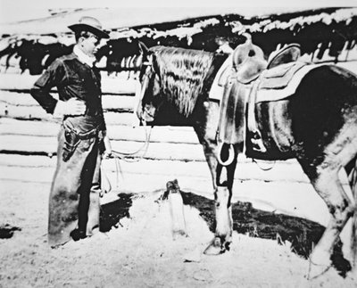 Butch Cassidy (1866-1908/09) med sin häst (s/v foto) av American Photographer