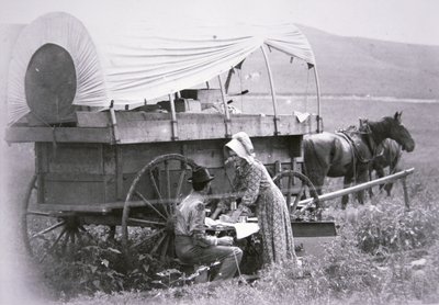 Typisk pionjärklädd vagn (s/v foto) av American Photographer