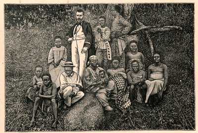 Upptäckaren Pierre Savorgnan av Brazza (1852-1905) och en grupp urbefolkningar från det apostoliska vikariatet för de två Guineas (Två Guineas) i Gabon. Gravyr i "Les Missions Catholiques au XIXeme Siecle"" av Louis-Eugene (Louis Eugene) Louvet. pr av Anonymous Anonymous