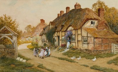 Barn som leker utanför en stuga i en by av Arthur Claude Strachan