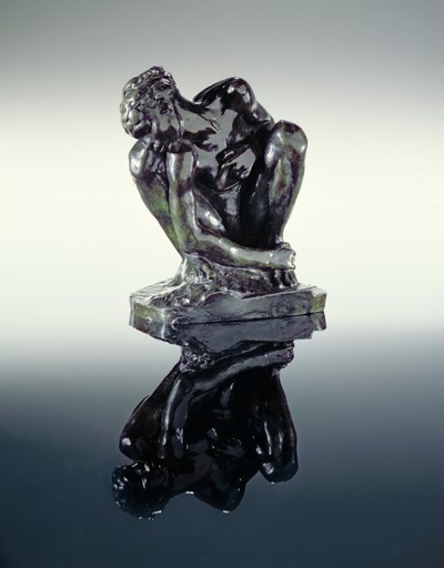 Hukande naken av Auguste Rodin