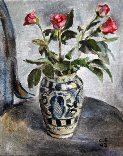 Rosa rosor i en målad kruka av Christian Furr