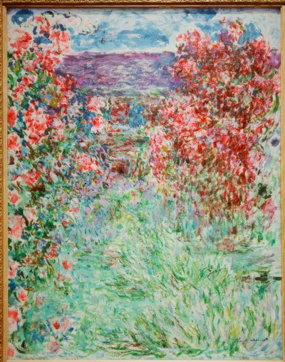 Huset bland rosorna av Claude Monet
