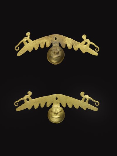 Ett par öronprydnader, 600-1600 AD (guld) av Culture Nariño