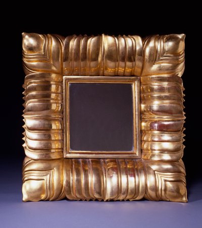En spegel av förgyllt trä, designad av Dagobert Peche (1887-1923), snidad med överlappande stiliserade bladblad, ca 1925 (förgyllt trä) av Dagobert Peche