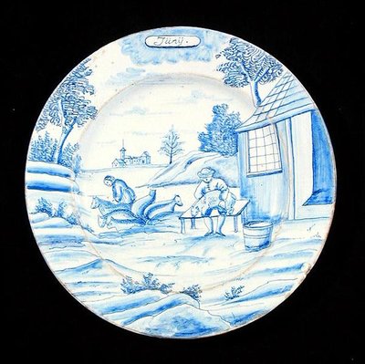 Tallrik från Delftware med juni månad (tennglaserat lergods) av Dutch School