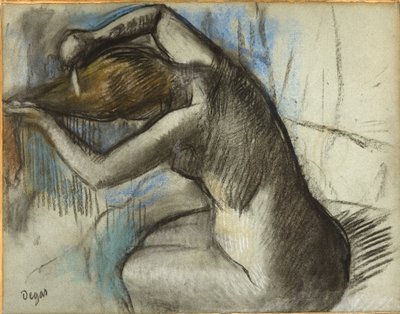 Sittande naken kvinna som borstar håret, ca 1885 (kol & pastell på blått papper) av Edgar Degas