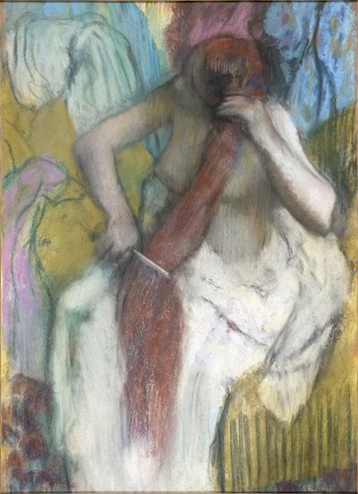 Kvinna som kammar sitt hår av Edgar Degas