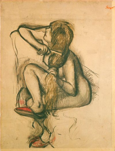 Kvinna som kammar sitt hår av Edgar Degas