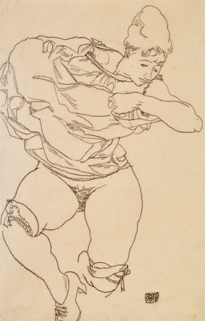 Kvinna som klär av sig, 1917. av Egon Schiele