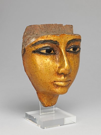 Ansikte från en kista, med ögon och ögonbryn inlagda, förgyllda av Egyptian 20th Dynasty