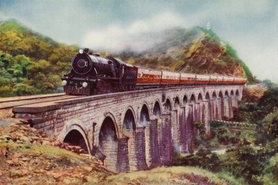 4-6-2 ånglok från Bombay, Baroda och Central India Railway som transporterar Frontier Mail som passerar en viadukt mellan Bombay och Delhi (färg litho) av English School