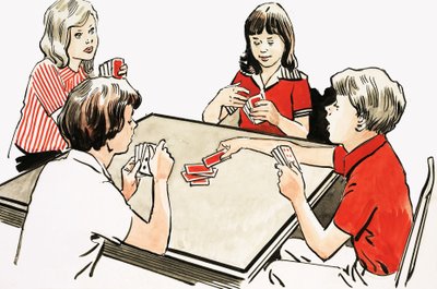 Fyra barn som spelar kort av English School