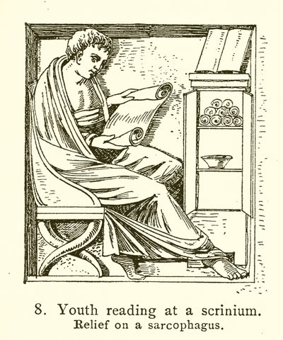 Jugendlicher liest an einem Schreibtisch von English School