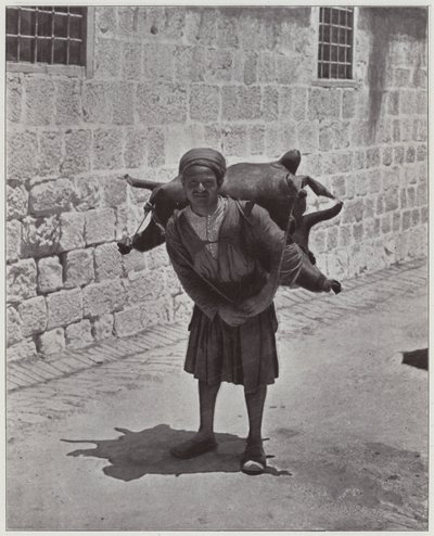 Jerusalem, en vattenbärare (s/v foto) av European Photographer