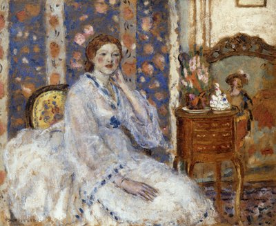 Kvinna som sitter i en fåtölj av Frederick Carl Frieseke