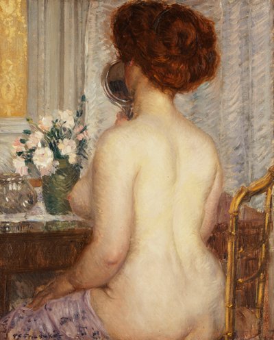 Kvinna vid ett toalettbord av Frederick Carl Frieseke