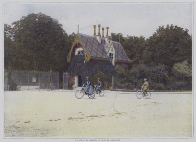 Cyklister som cyklar förbi Porte de Madrid i Bois de Boulogne, Paris (färgfoto) av French Photographer