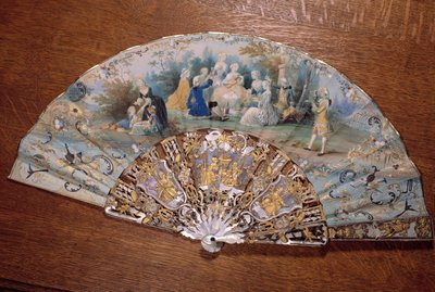 Fläkt som representerar en countrysmak. En grupp ädel picknick i en park. Chantilly från 1700-talet, Conde museum av French School