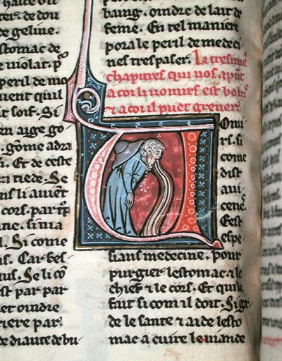 Historisk initial föreställande en man som kräks (vellum) av French School