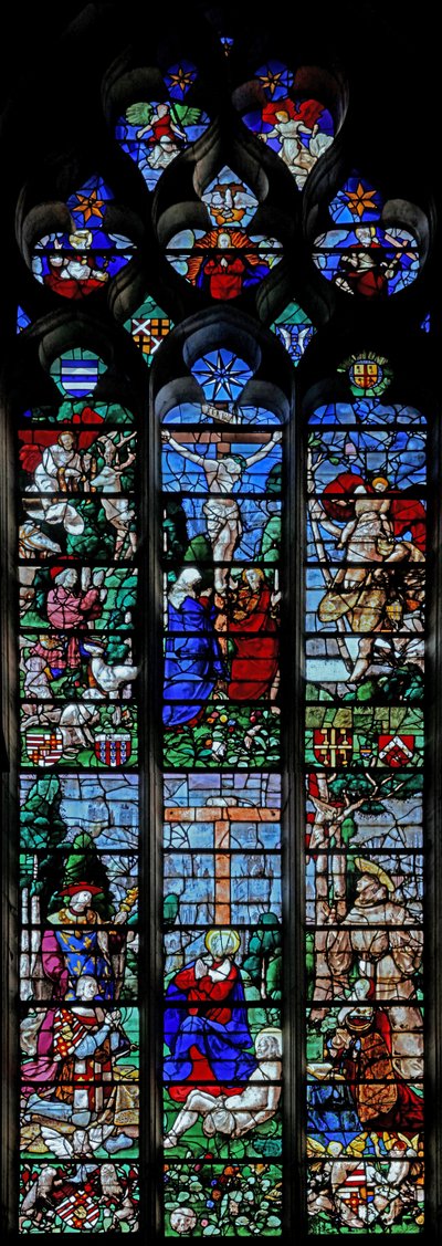 Fönster w25 som visar korsfästelsen med t Hubert och St Christopher; nedan är donatorn Louis de Roncherolles och hustru Francoise de Halluin med St Louis och St Francis av French School