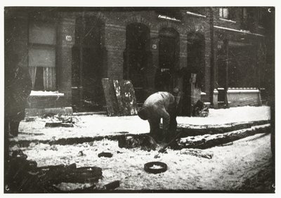 Byggnadsarbetare på jobbet i snön i Amsterdam av George Hendrik Breitner