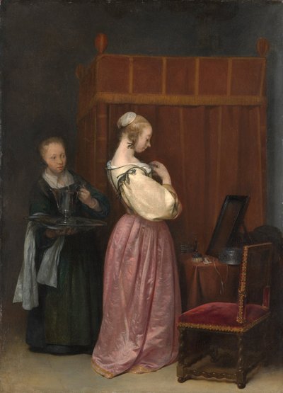 Ung kvinna har sin toalett av Gerard Terborch