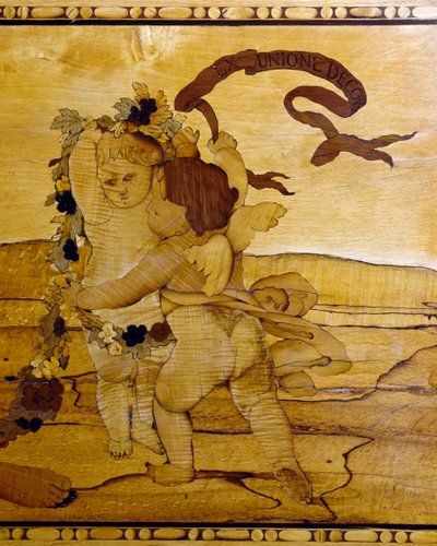 Amor, detalj från byrå med inlägg och marmorskiva av Giuseppe Maggiolini