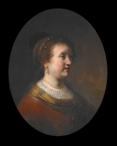 Kvinna i röd klänning och pärlor av Govaert Flinck