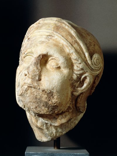 Krigarhuvud av Skopas (340-420 f.Kr.) framför Athena Alea-templet i Tegea, 300-talet f.Kr. (foto) av Greek