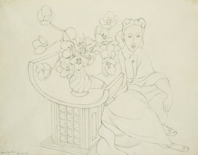 Sittande kvinna med tulpanvas av Henri Matisse