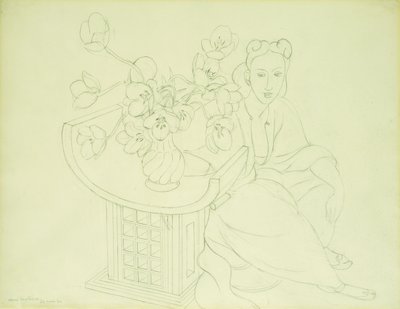Sittande kvinna med en vas med tulpaner av Henri Matisse