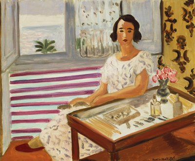 Kvinna sittande vid sitt sminkbord av Henri Matisse