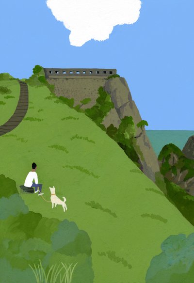 Vila med en hund på en gräsbacke. av Hiroyuki Izutsu