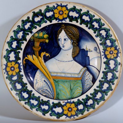Keramisk tallrik av Deruta decoree med ett porträtt av en kvinna. Omkring 1510 Sevres. Porslinstillverkning av Italian School