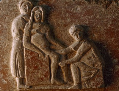 En relief från en romersk mans och hustrus grav visar en kvinna som föder barn. Museo A... av James L Stanfield
